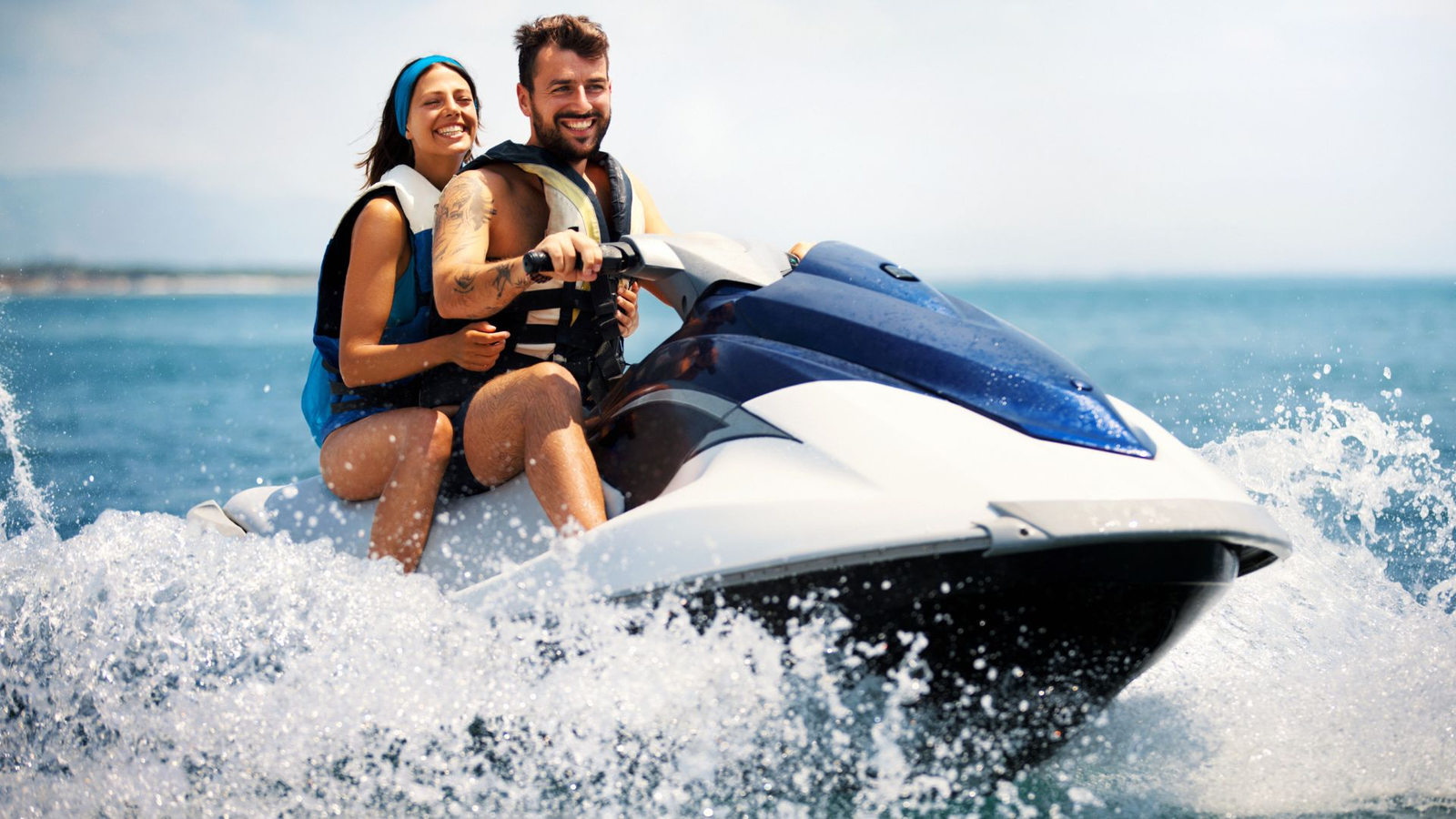 A couple enjoying a jet ski